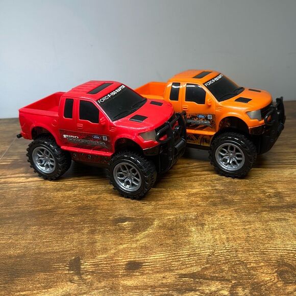 Ford F-150 Raptor Red Orange Plastic Truck set of 2 Made in China - Picture 1 of 9